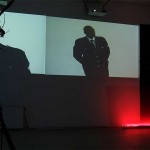 video projections and LCD screen with attendants